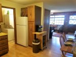 Kitchen opens to living room, and bath with washer/dryer
